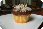 almond cupcakes with dark chocolate frosting and toasted coconut